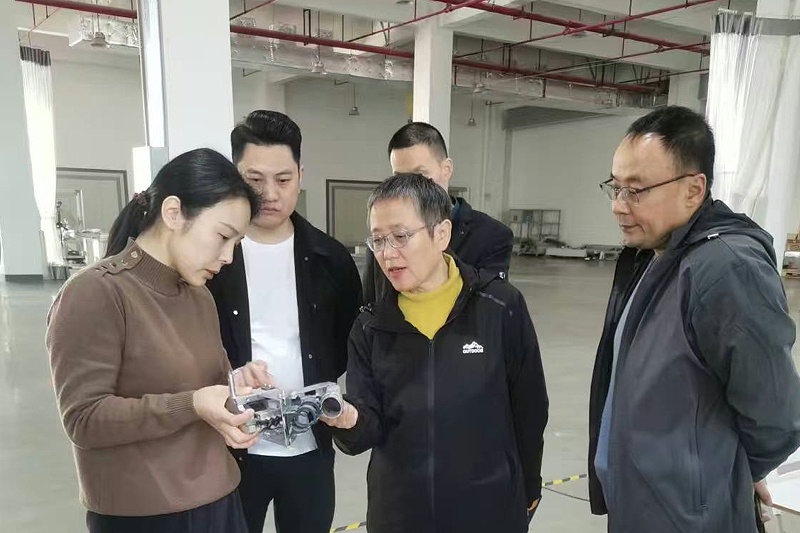 百华鞋业赴罗霸自动化系统(广东)有限公司考察并正式签订合同