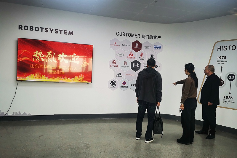 百华鞋业赴罗霸自动化系统(广东)有限公司考察并正式签订合同