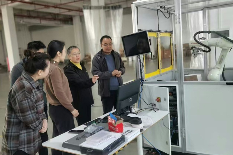 百华鞋业赴罗霸自动化系统(广东)有限公司考察并正式签订合同